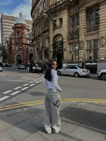 Load image into Gallery viewer, [PRE-ORDER] 2-WEEKS-THE ASILI MEGA BAGGY JEANS IN CLOUD GREY WITH BLACK EMBIRODERY
