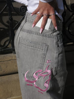 Load image into Gallery viewer, [PRE-ORDER] 3-WEEKS-THE ASILI MEGA BAGGY JEANS IN CLOUD GREY WITH PINK BUBBLEGUM EMBIRODERY
